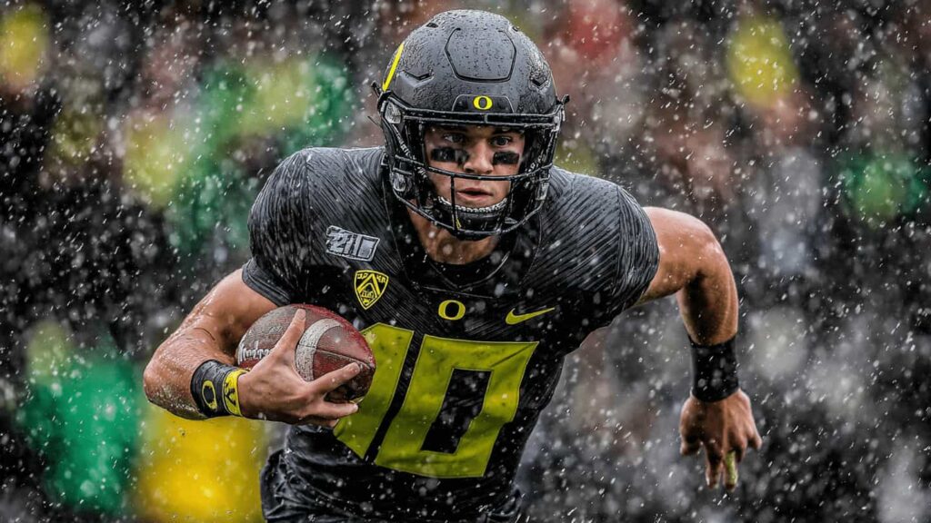 justin-herbert-playing-football